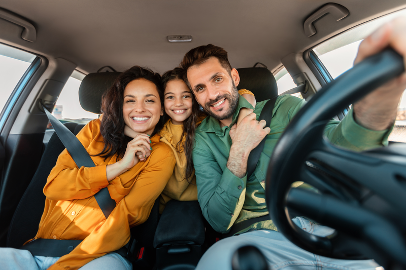 family in car