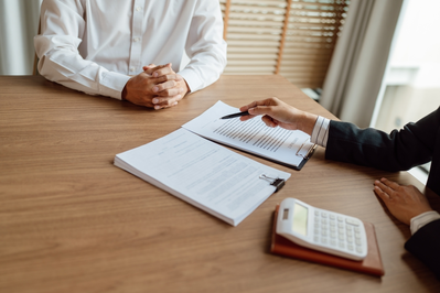 people reviewing insurance documents