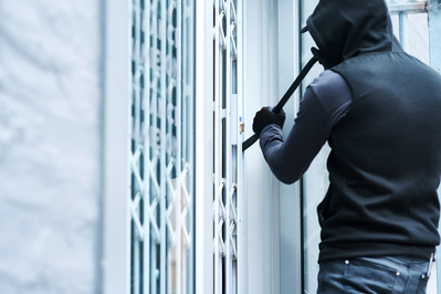 criminal breaking into house